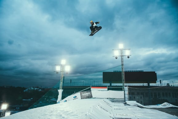 Fans can watch competitors catching big air at Breckenridge Resort. Photo by Austin Neill on Unsplash